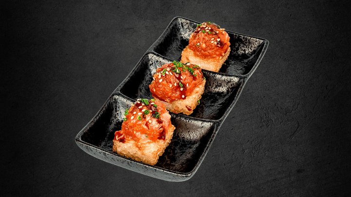 Crispy Rice TartareCrispy rice squares topped with a mix of