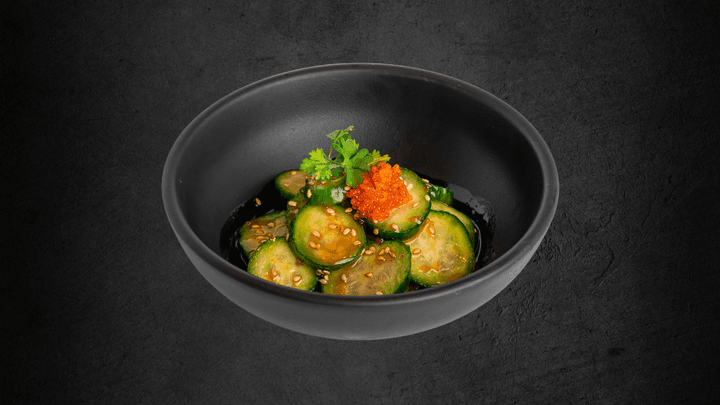 Cucumber SaladThinly sliced cucumbers in a house-made chili