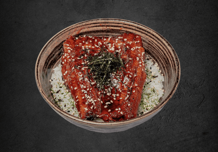 Unagi DonKabayaki glazed eel, shredded nori and sesame seeds